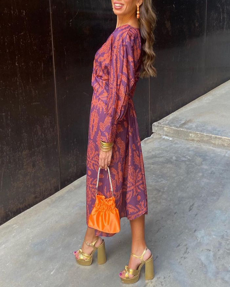 Evelyn | Chic Twist-Front Printed Midi Dress